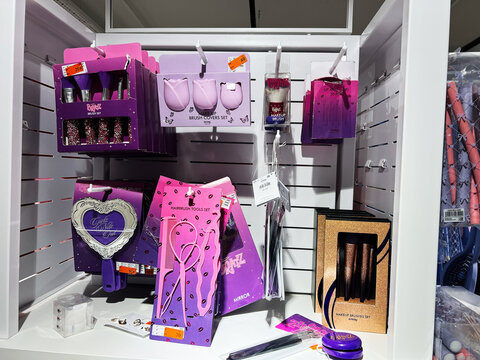 Kyiv, Ukraine - February 05, 2025: Kyiv, Ukraine - February 05, 2025: Display of purple Bratz beauty product sets and makeup brushes with packaging