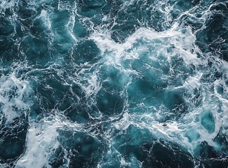 Dark teal water surface texture with ripples and waves