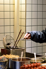 Preparing street food in China