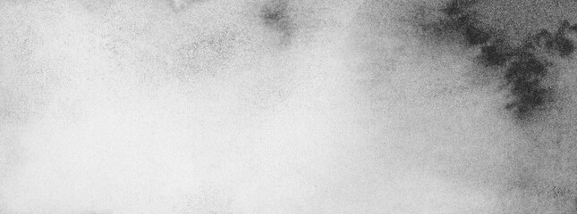 Black and white Ink watercolor hand drawn smoke flow stain blot on wet grain paper texture background.