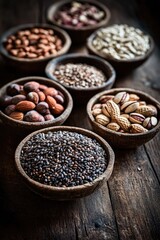 A variety of nuts and seeds are displayed in wooden bowls on a wooden table. The bowls are arranged in a row, with each one containing a different type of nut or seed. Concept of abundance and variety