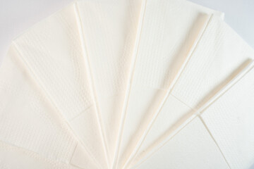 White napkins handkerchiefs on a white background