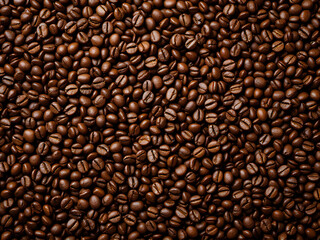 Obraz premium A close-up photograph of rich brown roasted coffee beans, showcasing their texture and aroma.