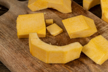 orange pumpkin fruit details cut into pieces for cooking