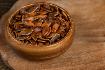 , overcooked or burnt pumpkin seeds on the table