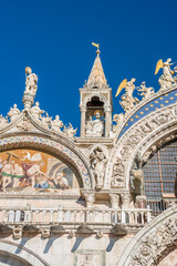 Obraz premium Facade of the Saint Mark's Basilica is the cathedral of Venice, in Italo-Byzantine architecture. It is symbol of Venetian wealth and power, since 11th century it known as Church of Gold. Italy, 2019