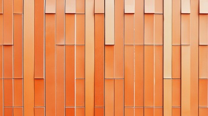 A striking orange wall features a contemporary design with alternating panels and geometric patterns, perfect for urban aesthetics or artistic backgrounds