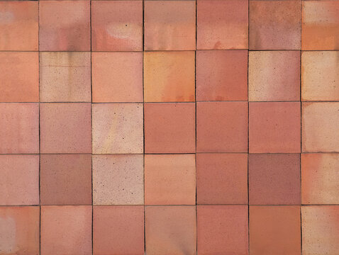 Coral brown terracotta ceramic tiles cladding texture for interior, exterior wall, dividing wall, facade, yard, floor. Natural handmade reddish pinkish outdoor square clay slabs background.	 - Powered by Adobe