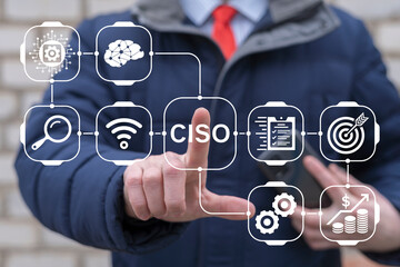 Business person using virtual touch screen push abbreviation: CISO. CISO - Chief Information...