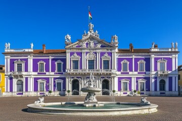Naklejka premium A charming square radiates from the heart of an old European city. Domodossola, an ancient municipality in northern Italy, preserves its historic center, which includes the Palazzo di Città. The