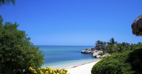 Tropical Beach Panorama With Lush Foliage And Thatched Hut