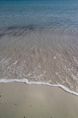 wind marks on the beach Shapes sculpted by the wind and surf around pebbles  on La Cinta beach. San Teodoro Nuoro, Sardinia. Italy