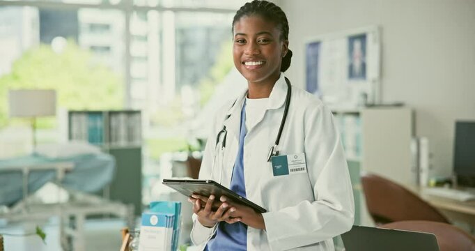 Smile, black woman and face of doctor on tablet in hospital for online healthcare research. Technology, medical professional and portrait of happy African surgeon, worker or employee typing in clinic
