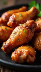 Pile of succulent roasted chicken wings, seasoned perfectly , flavorful, home cooking