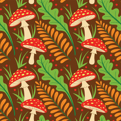 Seamless pattern with amanita mushrooms and leaves. Autumn background
