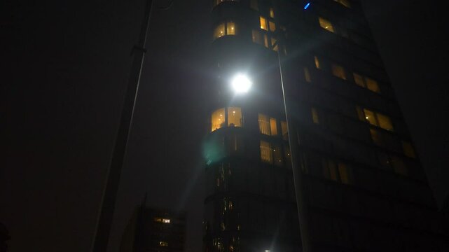 LED Streetlight at Night with Apartments Flats Tall Building Night Dark Evening
