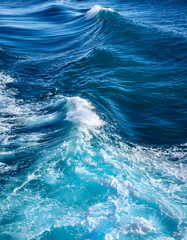 Sea water texture. Turquoise blue water, ocean sea texture with foam and waves