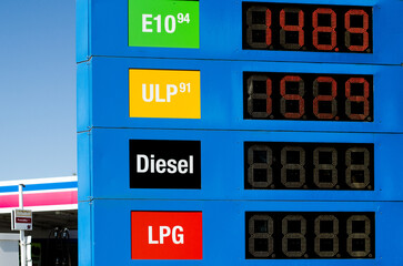 a fuel price board at a service station displaying different types of fuel (E10, ULP, Diesel, LPG)...