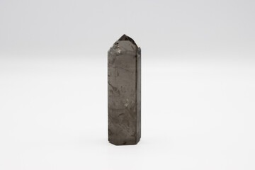 Smoky quartz crystal baguette isolated on white background
