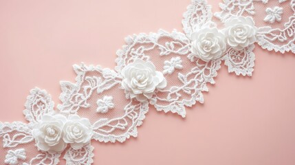 Delicate white lace adorned with roses on pink