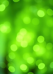 Obraz premium Spring background - abstract banner - green blurred bokeh lights with copy space bokeh green bokeh green abstract background light bright blur pattern