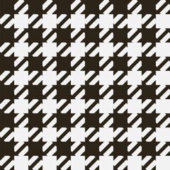 Seamless houndstooth pattern. Classic plaid design. It is characterized by a pattern of alternating squares resembling a scattered star in two colors.