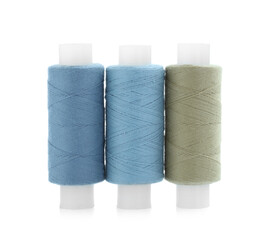 Spools of bright sewing threads isolated on white