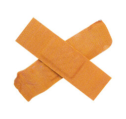 cross adhesive bandage on white background