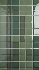 Close-up of a green and white mosaic tiled wall with a reflective surface, creating a geometric pattern. Ideal for backgrounds, interior design, and architectural elements

