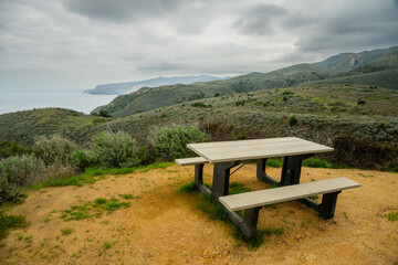 Picnic Table Overlooks The Northern Coast Of Santa Cruz Island Along The Del Norte Trail