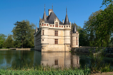 View of the Azay-le-Rideau Castle, a medieval castle above the bend of the Indre river, in the commune of the same name on a sunny summer day, Indre-et-Loire, France