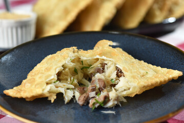 fried pastry with cod filling fish food taste