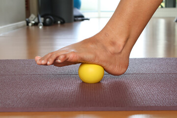 Use a foot massage ball to relieve plantar fascia.
