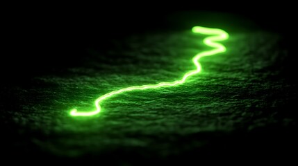 Glowing green energy line across dark surface