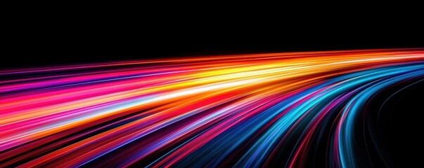 A vibrant display of colorful light trails on a dark background, creating a dynamic sense of movement and energy.