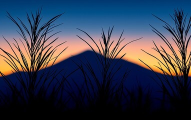 Fototapeta premium Silhouette mountain sunrise through grass. Landscape photo