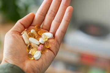 Multicolored Pills in Hand Captured Clearly