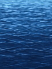 Obraz premium A serene view of calm blue water, showcasing gentle ripples and waves, creating a tranquil and peaceful atmosphere.