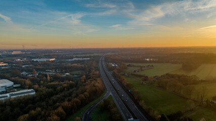 aerial view of landscape with german autobahn during sunset
