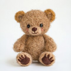 Obraz premium A classic brown teddy bear with tiny embroidered paws, on isolated white background