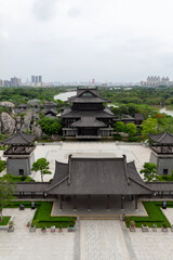 modern buildings and traditional pavilion in the park