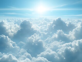 High-altitude view of fluffy clouds with bright sun