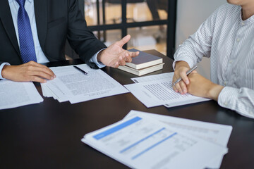 Lawyer Legal counsel presents to the client a signed contract with gavel and legal law. justice and lawyer Business partnership meeting concept.