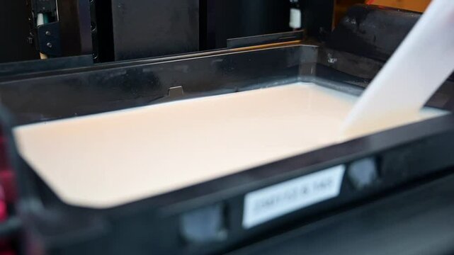 3D printer stirring resin in dentist lab