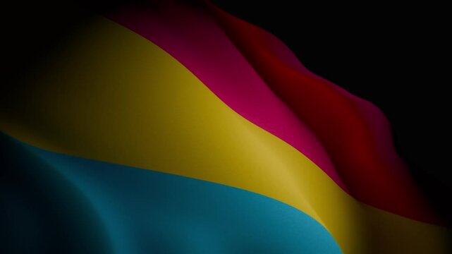 A closeup, spotlight-lit realistic 3D animation of a waving pansexual pride flag, showcasing its vibrant colors and fluid motion