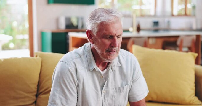 Elderly man, shoulder pain and stress on sofa with discomfort, joint tension and sprain. Senior person, hurt and arm injury in home with stretching, arthritis and muscle stiffness in retirement