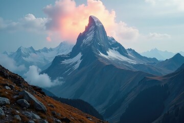 The rugged and mysterious peak of a mountain rises above the valley below under overcast sky with scattered clouds, terrain, mountain peak