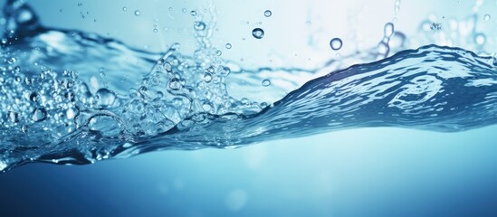 Macro close up view of water splash texture on blue color toned for background