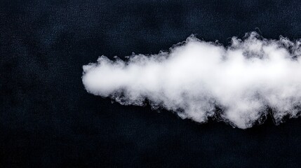 Fluffy White Cloud Against Dark Background