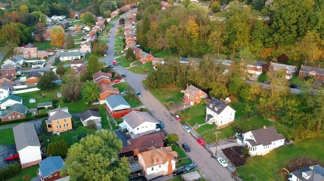 Aerial view of Bower Hill road and Mill St in Bridgeville, PA nearby pittsburgh in allegheny county showing roads, street and houses of the bridgeville town borough during day.